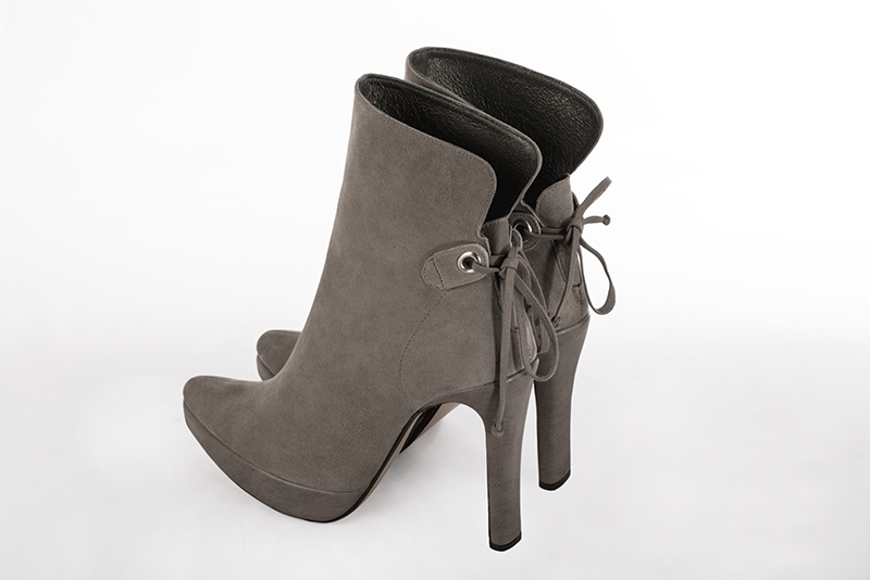Taupe brown women's ankle boots with laces at the back. Tapered toe. Very high slim heel with a platform at the front. Rear view - Florence KOOIJMAN